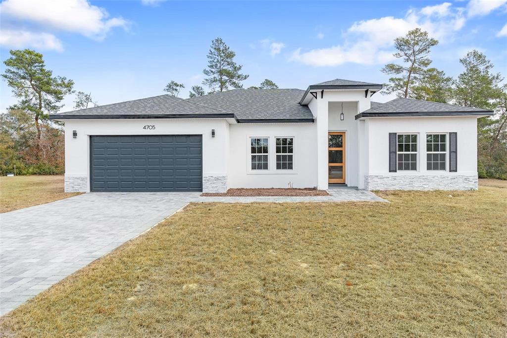 4705 Southwest 159th Lane Ocala, FL 34473 - Photo 2 of 28 front view of a house