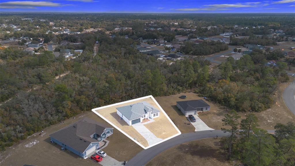 4705 Southwest 159th Lane Ocala, FL 34473 - Photo 6 of 28 an aerial view of a house with a yard