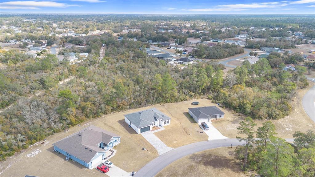 4705 Southwest 159th Lane Ocala, FL 34473 - Photo 8 of 28 an aerial view of a house with a city view