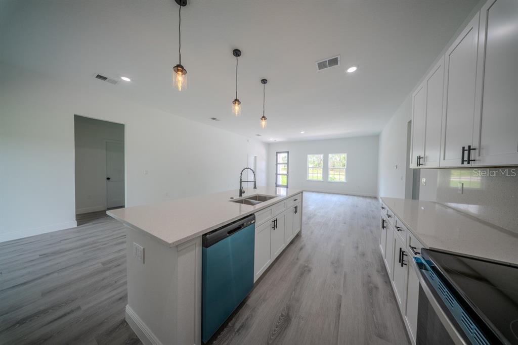 4705 Southwest 159th Lane Ocala, FL 34473 - Photo 10 of 28 a large kitchen with a lot of counter space