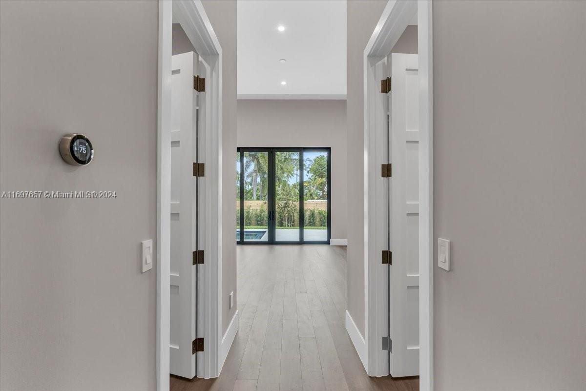 751 Northeast 2nd Street Boca Raton, FL 33432 - Photo 24 of 56 a view of a bathroom from a hallway