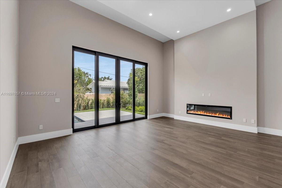 751 Northeast 2nd Street Boca Raton, FL 33432 - Photo 28 of 56 a view of a room with wooden floor and window