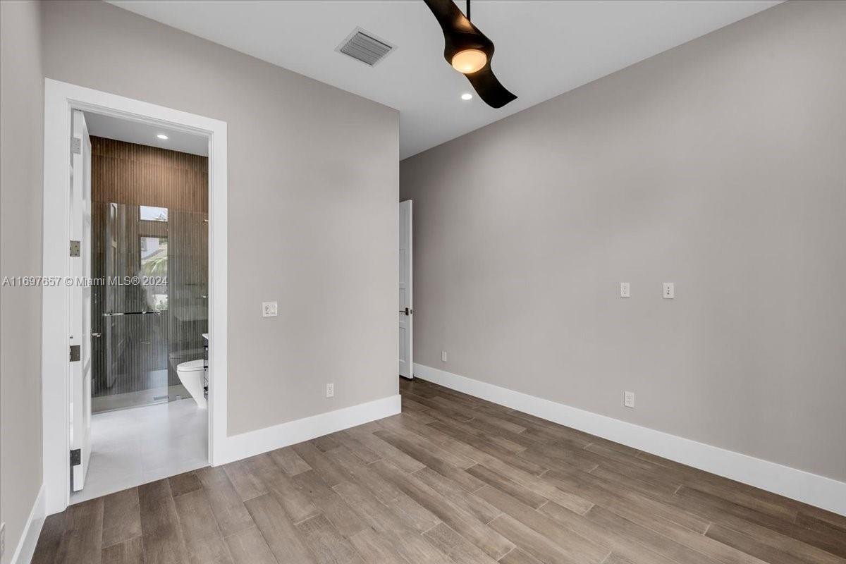 751 Northeast 2nd Street Boca Raton, FL 33432 - Photo 34 of 56 wooden floor in an empty room