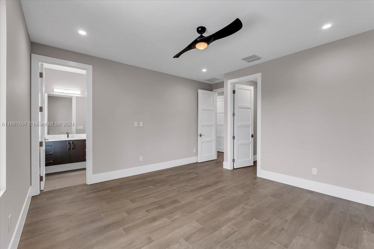 751 Northeast 2nd Street Boca Raton, FL 33432 - Photo 47 of 56 a view of a livingroom with a ceiling fan and window