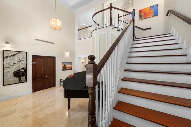 a view of an entryway with a chandelier