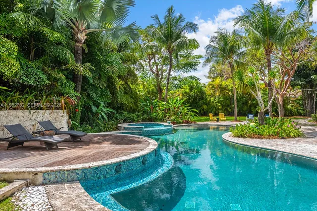 a view of a house with a swimming pool