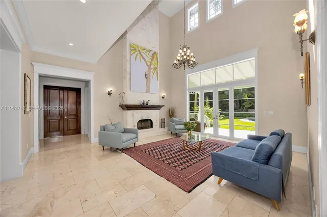 a kitchen with kitchen island granite countertop a stove and a center island