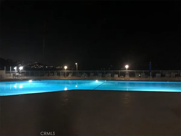 a view of swimming pool and an outdoor space
