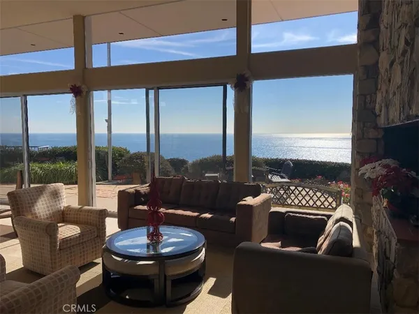 a view of a balcony with an empty space and a window
