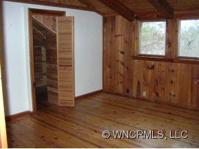 1448 Silvers Mill Road Marshall, NC 28753 - Photo 7 of 12 an empty room with window