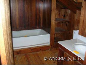 1448 Silvers Mill Road Marshall, NC 28753 - Photo 8 of 12 a view of walk in closet
