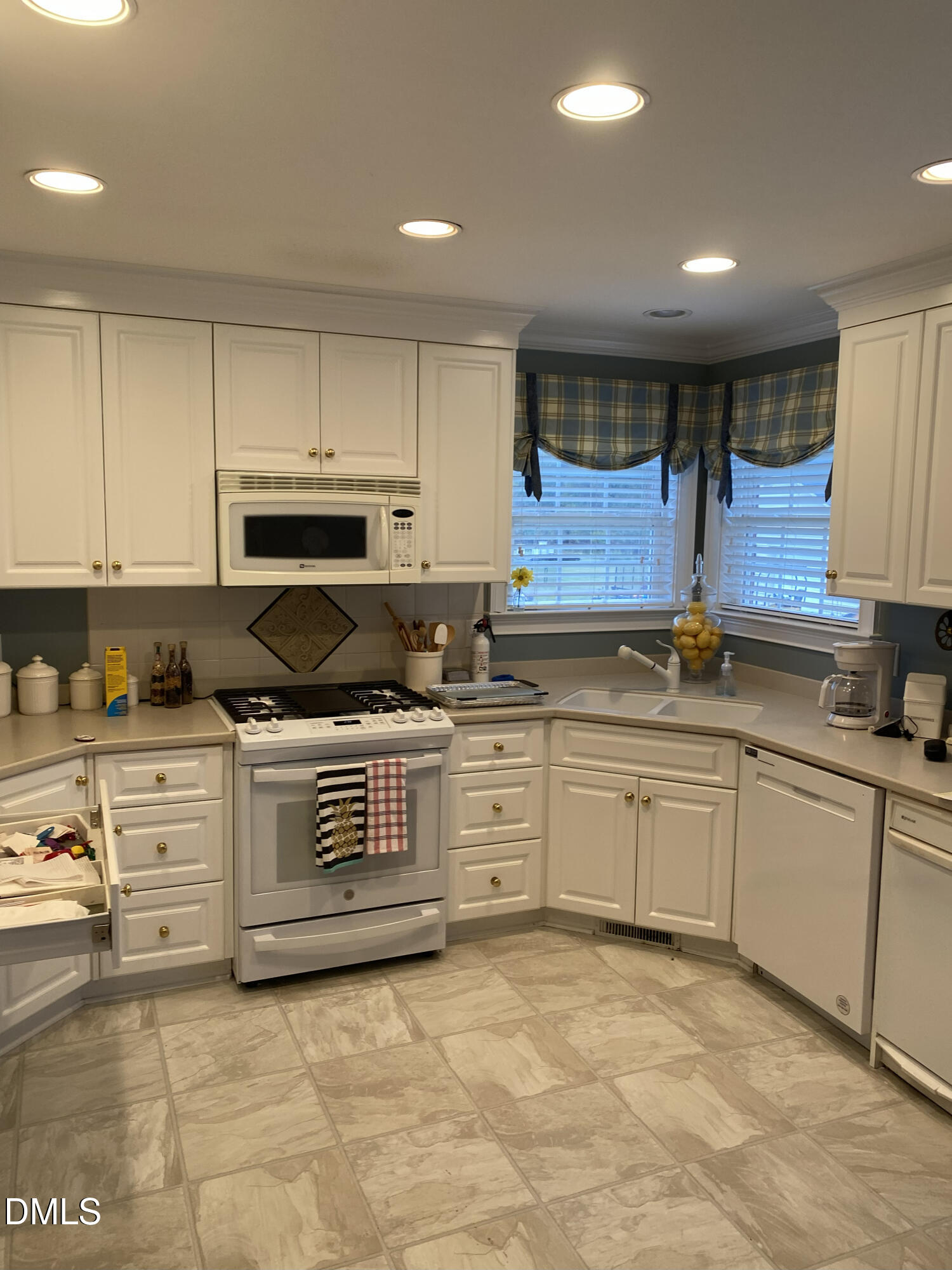 590 Hobson Road Dunn, NC 28334 - Photo 1 of 62 a kitchen with stainless steel appliances granite countertop a stove a sink and a microwave