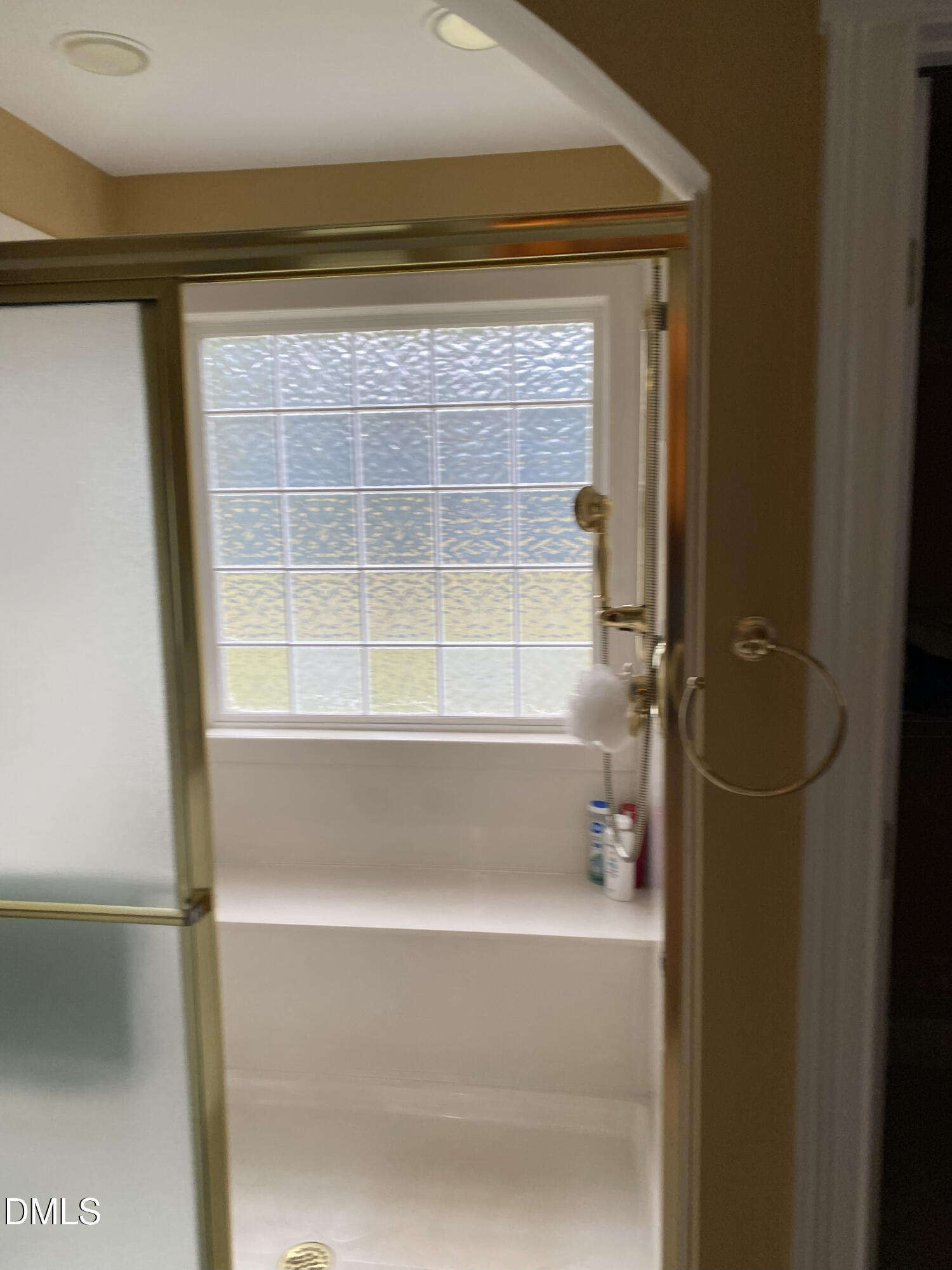 590 Hobson Road Dunn, NC 28334 - Photo 24 of 62 a bathroom with a bathtub and a shower