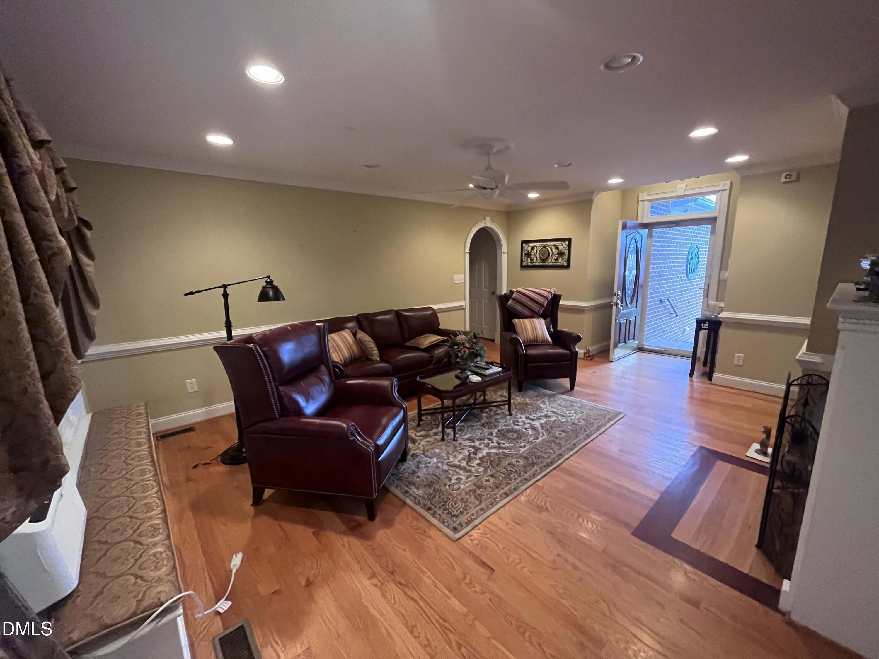 590 Hobson Road Dunn, NC 28334 - Photo 26 of 62 a living room with furniture and a wooden floor