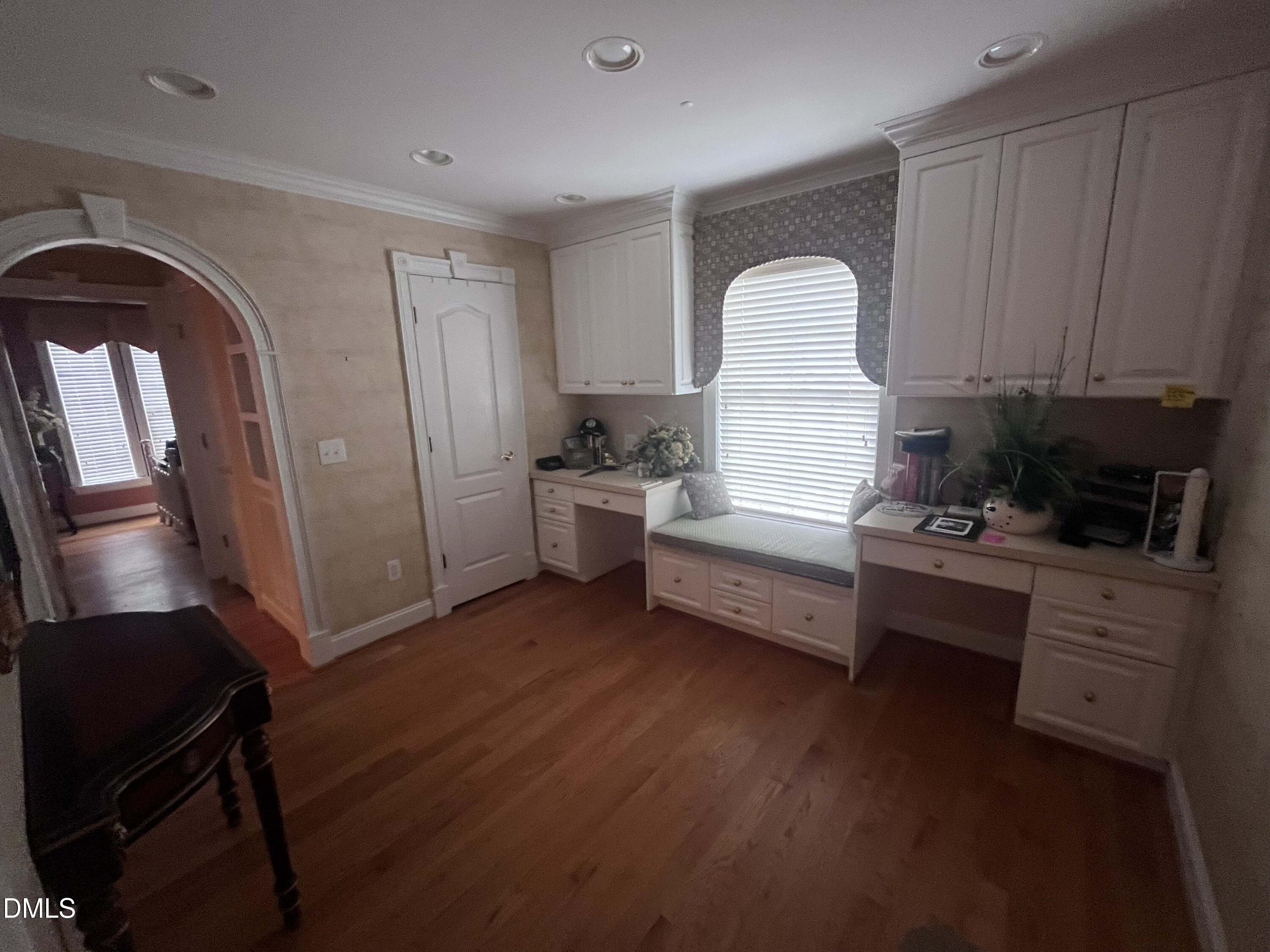 590 Hobson Road Dunn, NC 28334 - Photo 27 of 62 a kitchen with sink refrigerator and cabinets