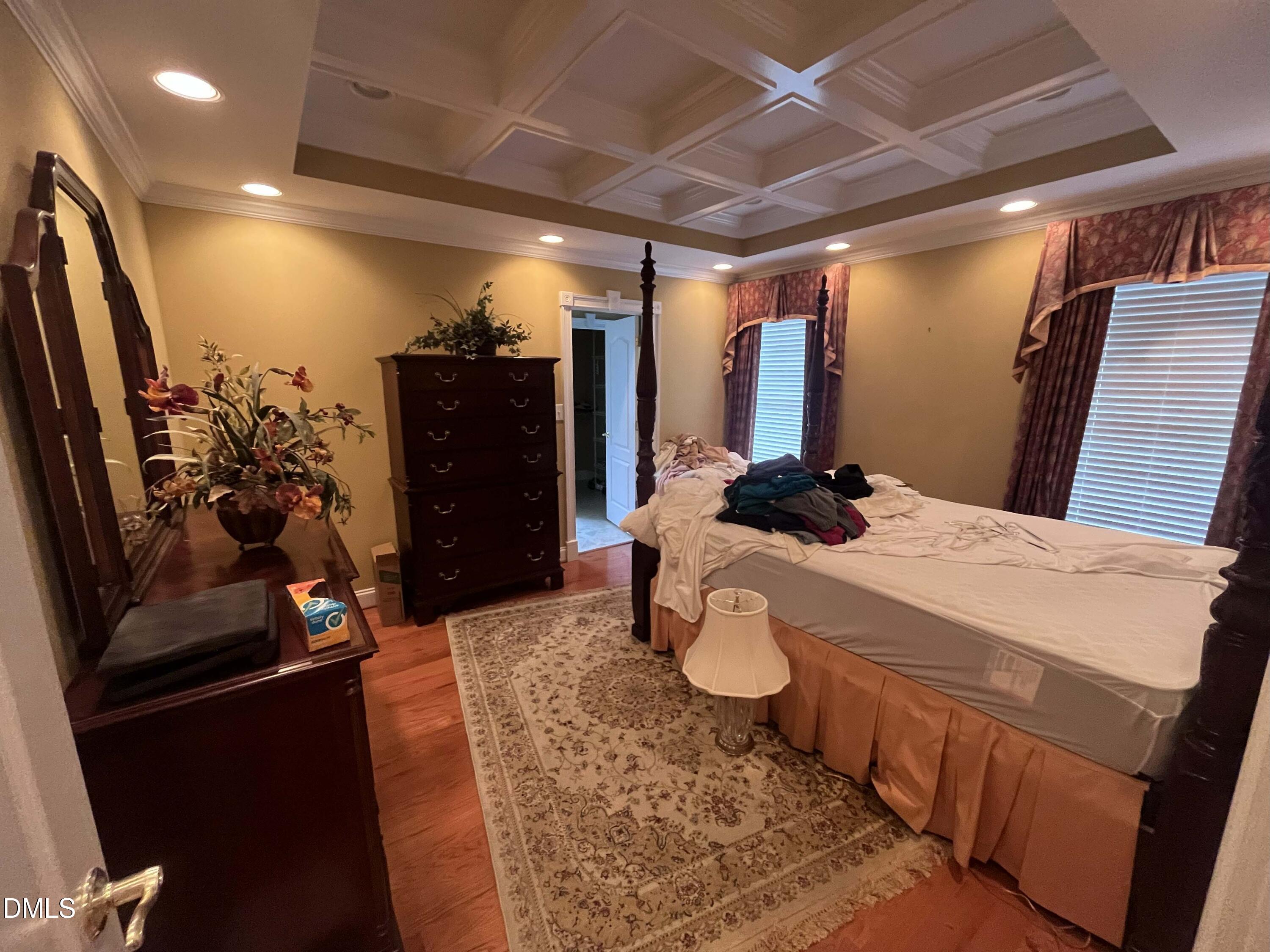 590 Hobson Road Dunn, NC 28334 - Photo 31 of 62 a bedroom with a bed and a flat screen tv