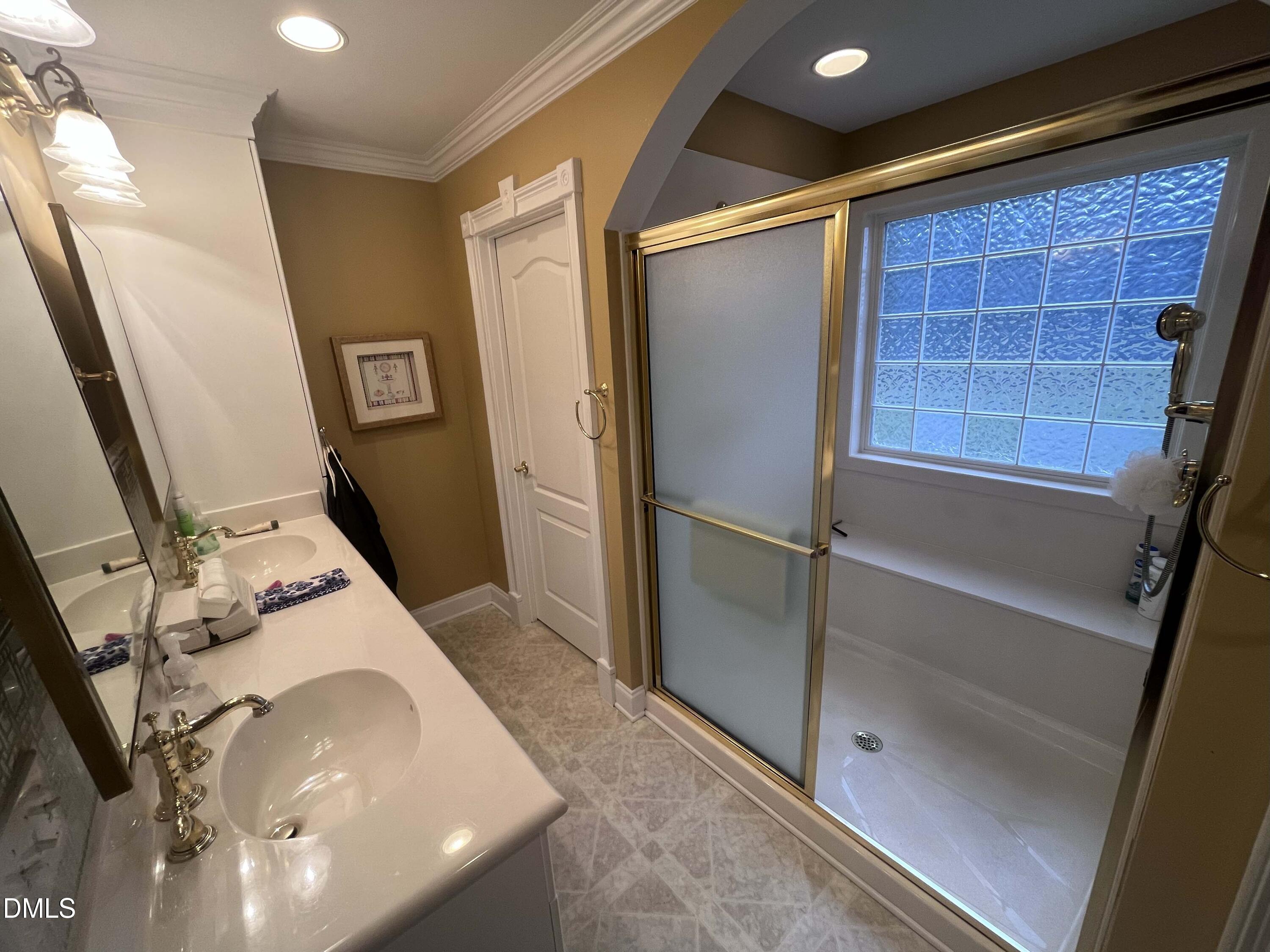 590 Hobson Road Dunn, NC 28334 - Photo 32 of 62 a bathroom with a sink and a mirror