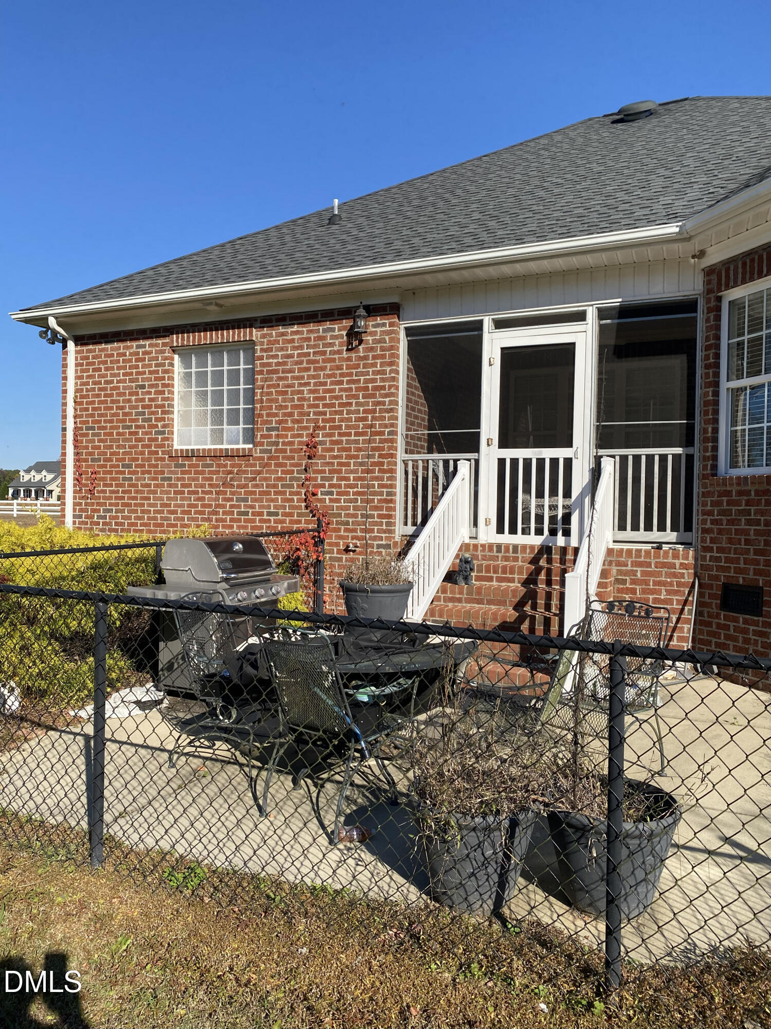 590 Hobson Road Dunn, NC 28334 - Photo 43 of 62 a backyard of a house with yard fire pit barbeque oven and outdoor seating