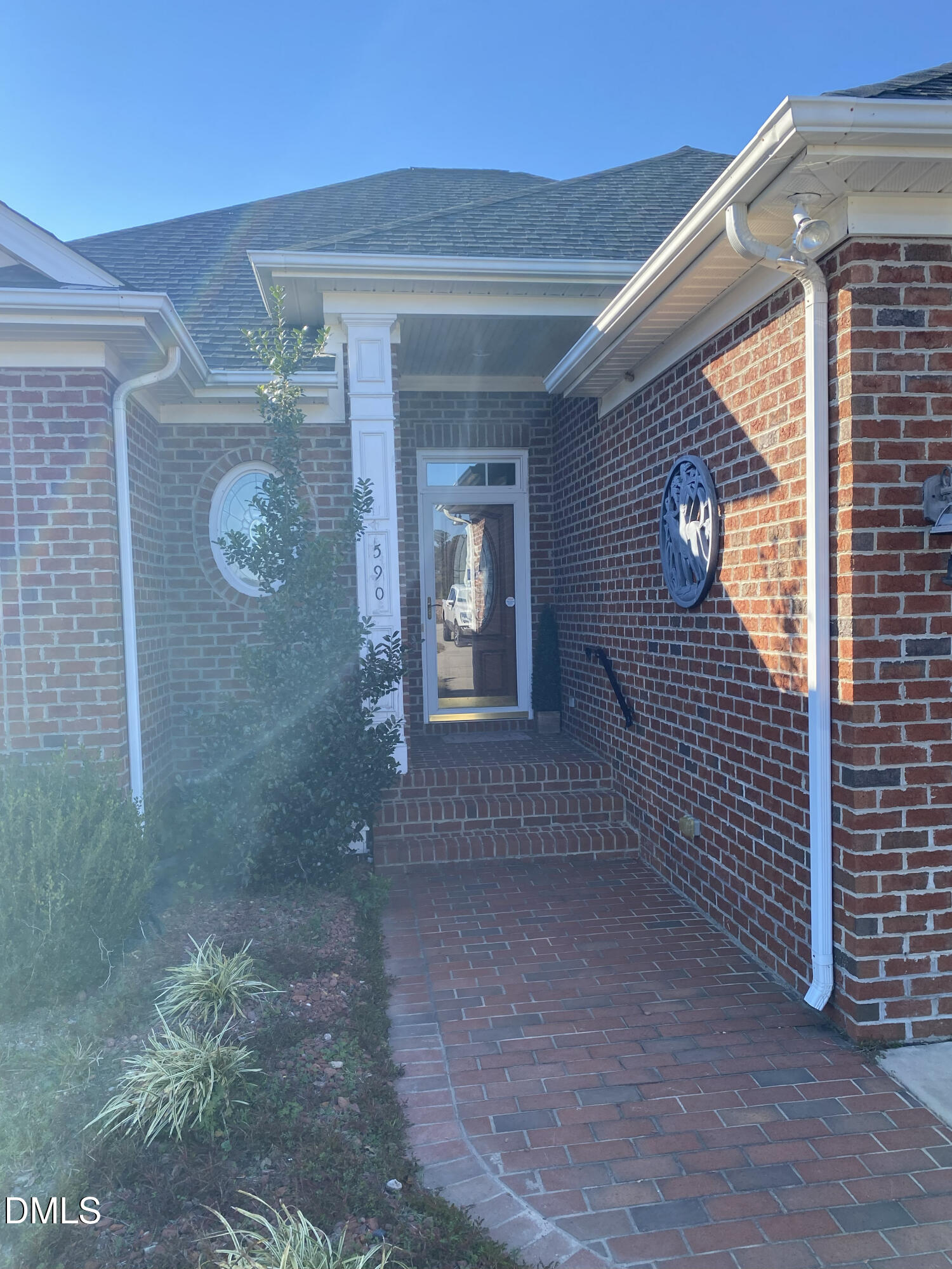 590 Hobson Road Dunn, NC 28334 - Photo 50 of 62 a view of a brick house with a large window