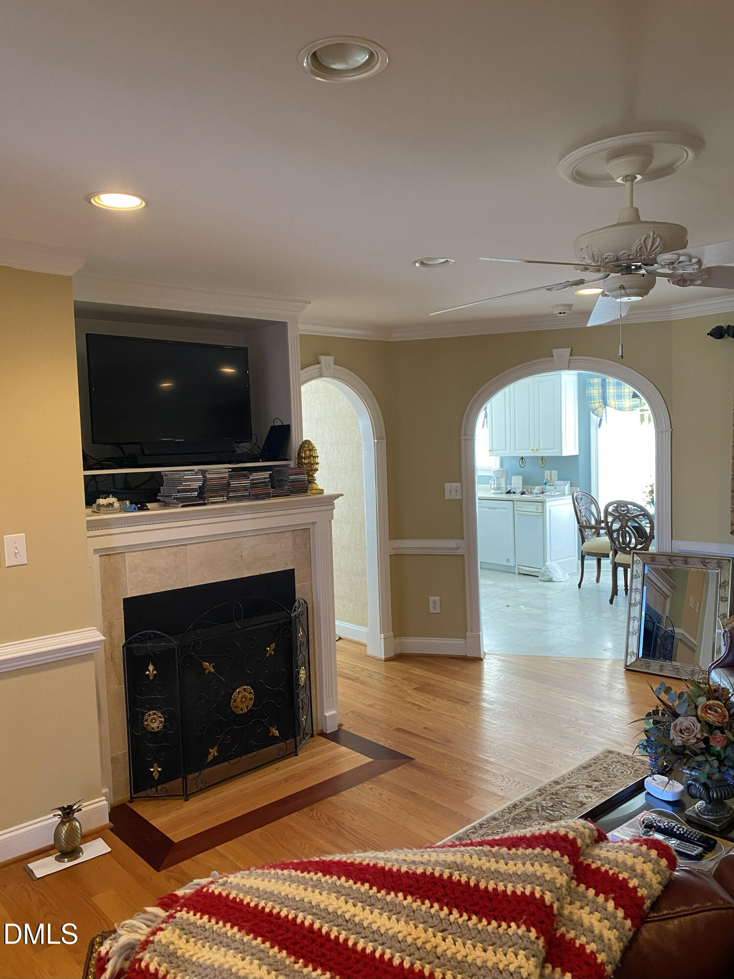 590 Hobson Road Dunn, NC 28334 - Photo 53 of 62 a living room with furniture a flat screen tv and a fireplace
