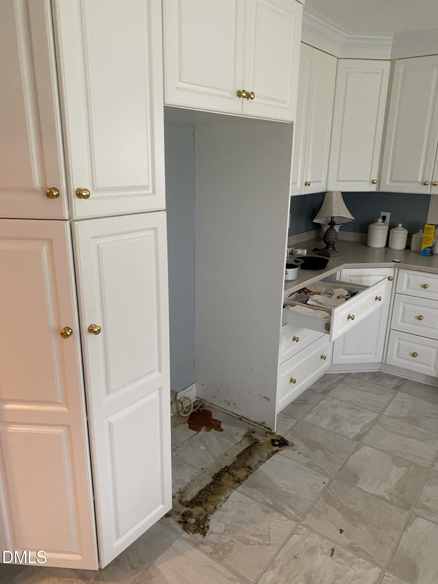 590 Hobson Road Dunn, NC 28334 - Photo 7 of 62 a kitchen with cabinets and a stove