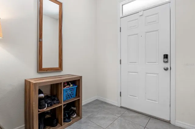 a view of storage and utility room with closet