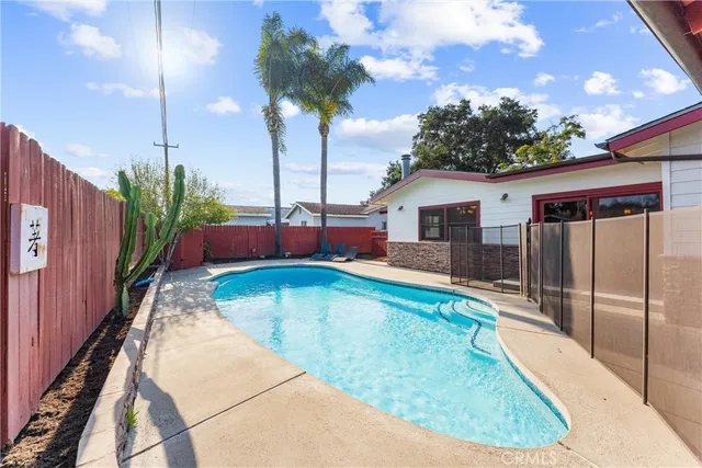 a view of a house with swimming pool