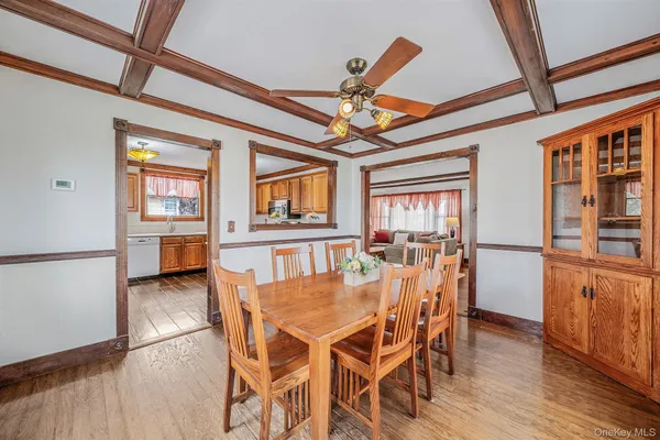 a large kitchen with stainless steel appliances granite countertop a stove sink and cabinets