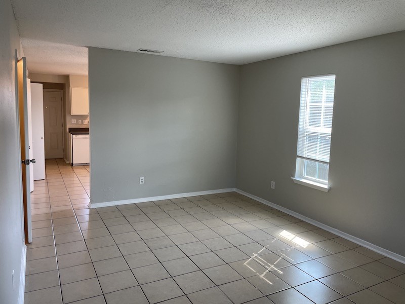 8401 Colony Loop Drive, Unit D Austin, TX 78724 - Photo 6 of 18 a view of an empty room and window