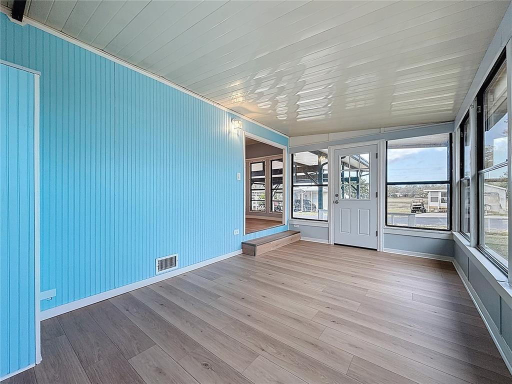 9569 Gray Fox Drive Weeki Wachee, FL 34613 - Photo 6 of 27 a view of an empty room with a window