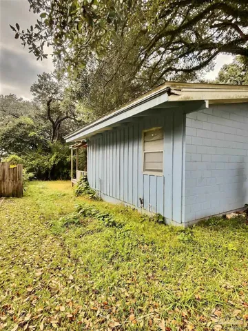 a house with trees in front of it