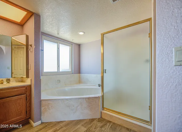 a bathroom with a sink double vanity and a mirror