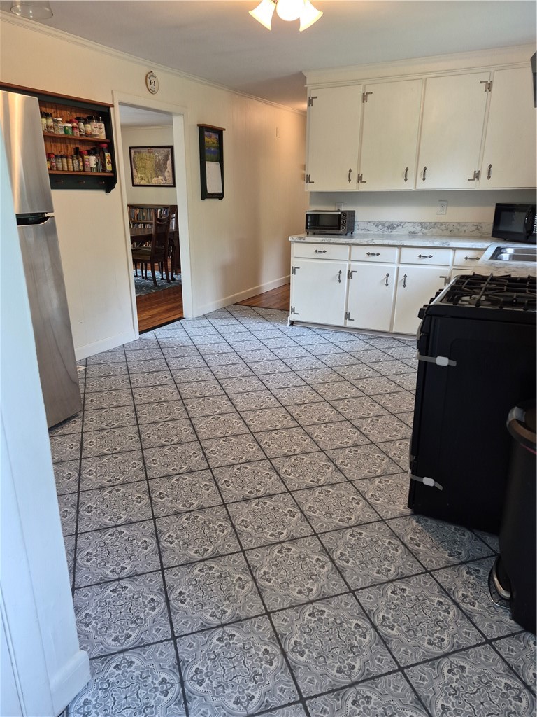 345 Stone Church Road Tiverton, RI 02878 - Photo 39 of 40 View of kitchen from deck