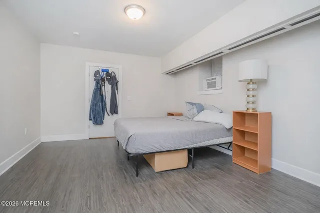 a bedroom with a bed and a table