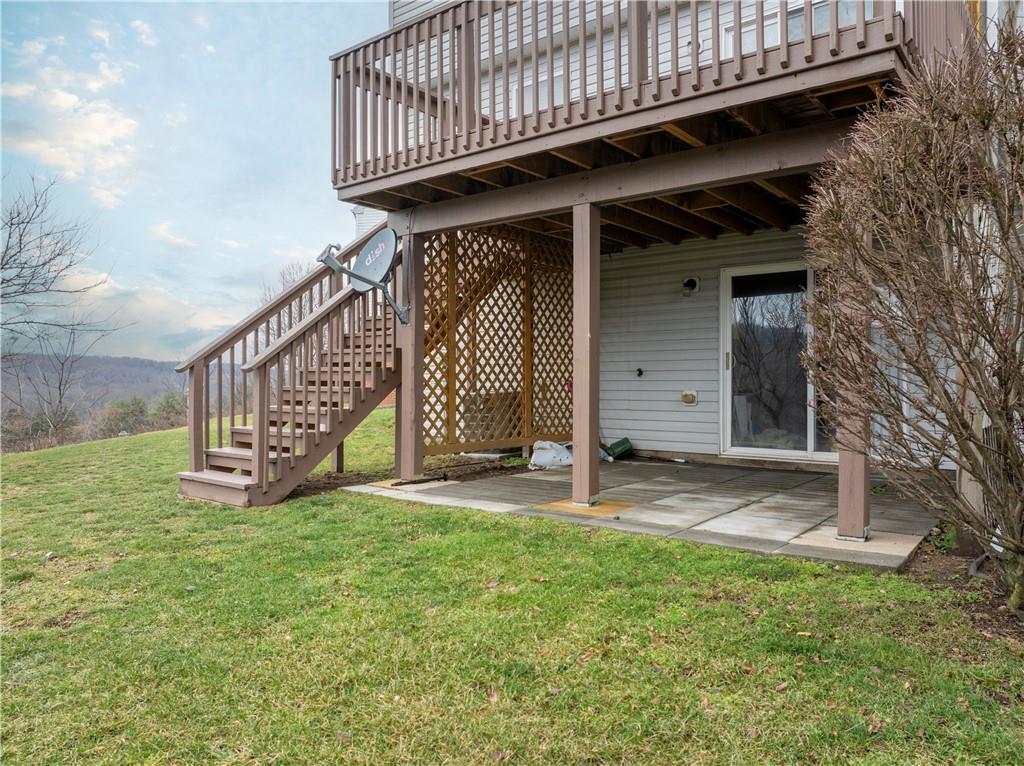 2008 Arbor Ridge Court Cheswick, PA 15024 - Photo 23 of 26 Stairs leading from the deck to the yard are a special feature of this home.
