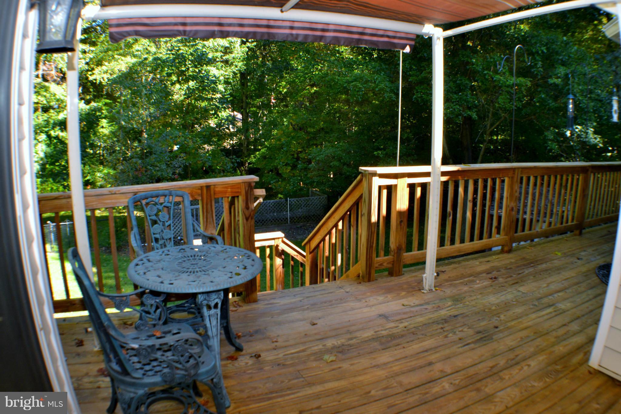 9185 Nana Russell Road Owings, MD 20736 - Photo 13 of 30 Rear Deck off Sunroom