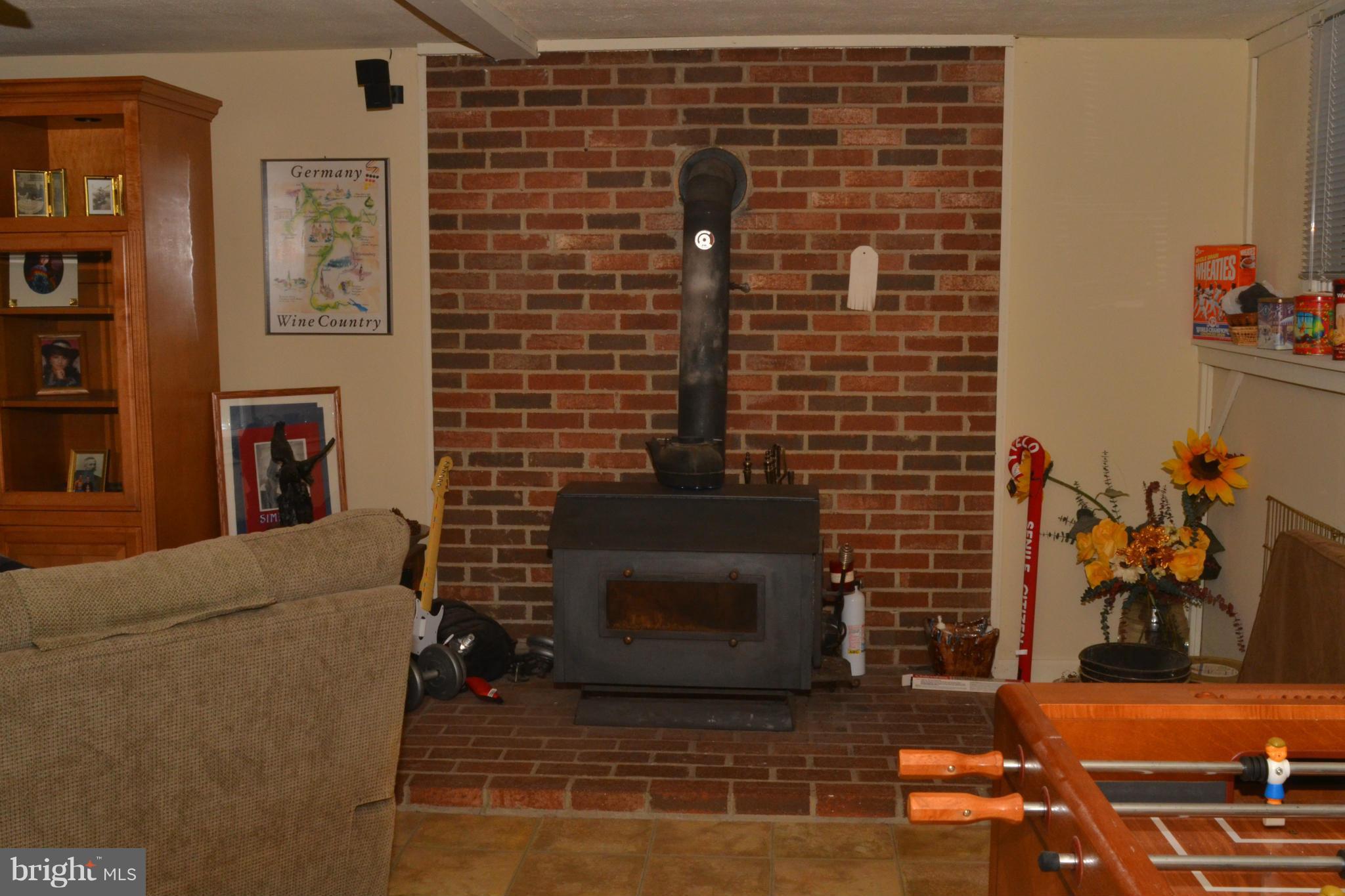 9185 Nana Russell Road Owings, MD 20736 - Photo 22 of 30 Family Room/Woodstove