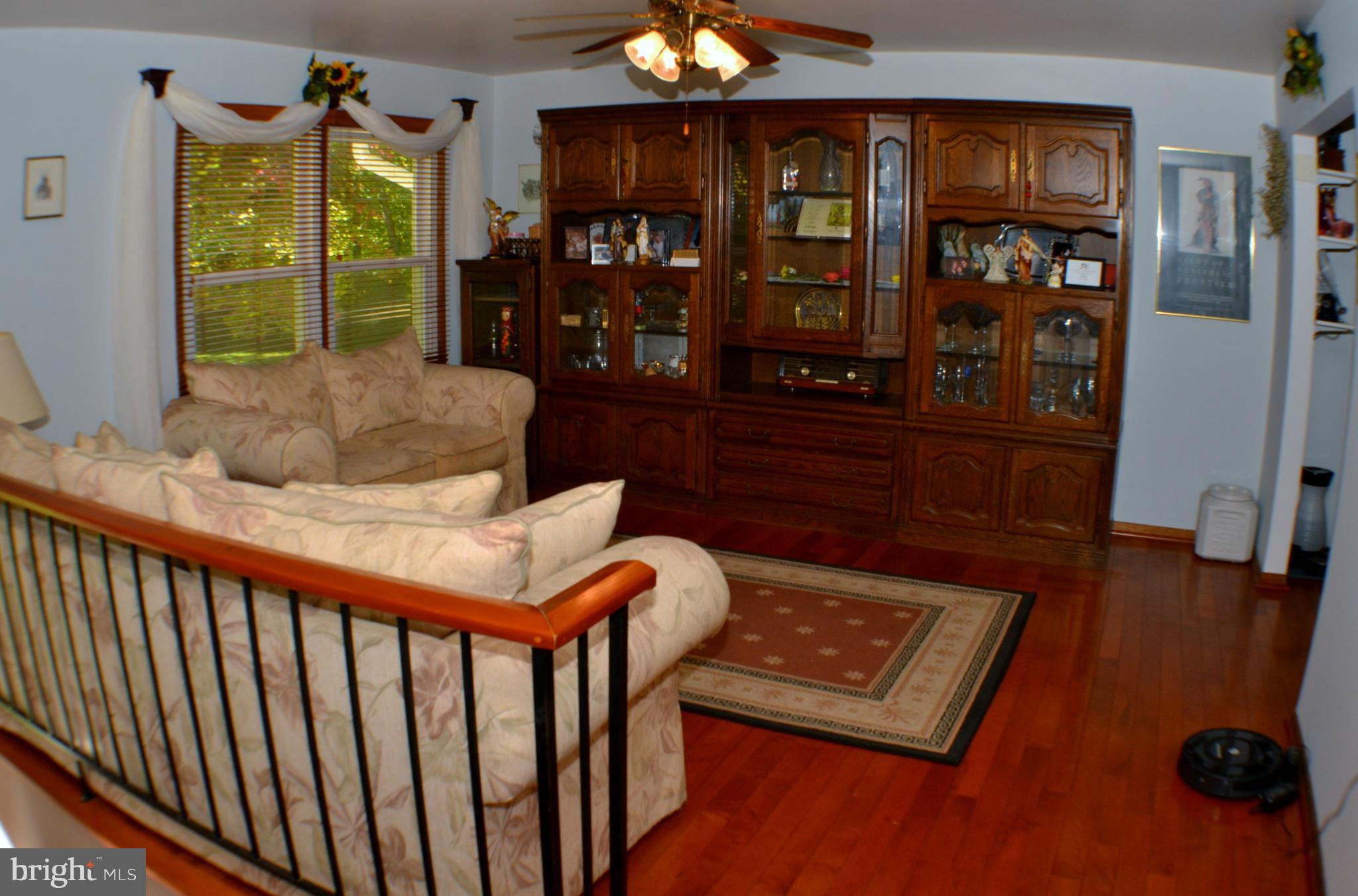 9185 Nana Russell Road Owings, MD 20736 - Photo 6 of 30 Living Room.Cherry Floors