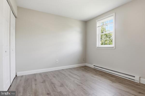 3496 Fox Ridge Court Dover, PA 17315 - Photo 19 of 35 an empty room with wooden floor and windows