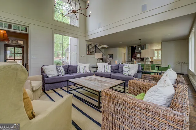 a view of an entryway with wooden floor and stairs