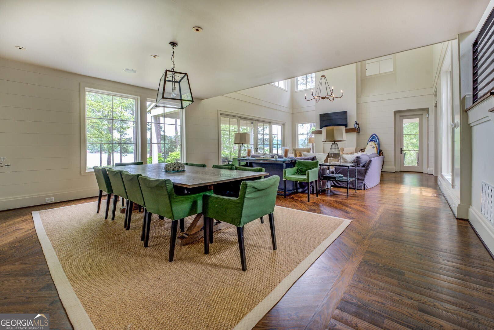 172 Tater Hill Road Jackson, GA 30233 - Photo 25 of 84 a dining room with furniture a chandelier and wooden floor