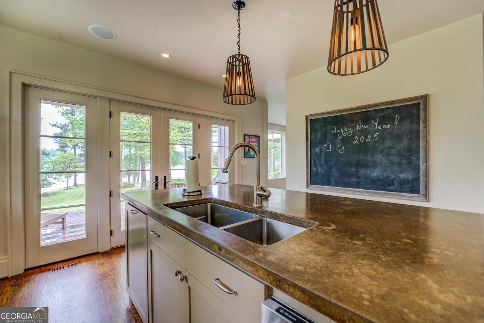 172 Tater Hill Road Jackson, GA 30233 - Photo 32 of 84 a kitchen with a sink a counter top space and a window