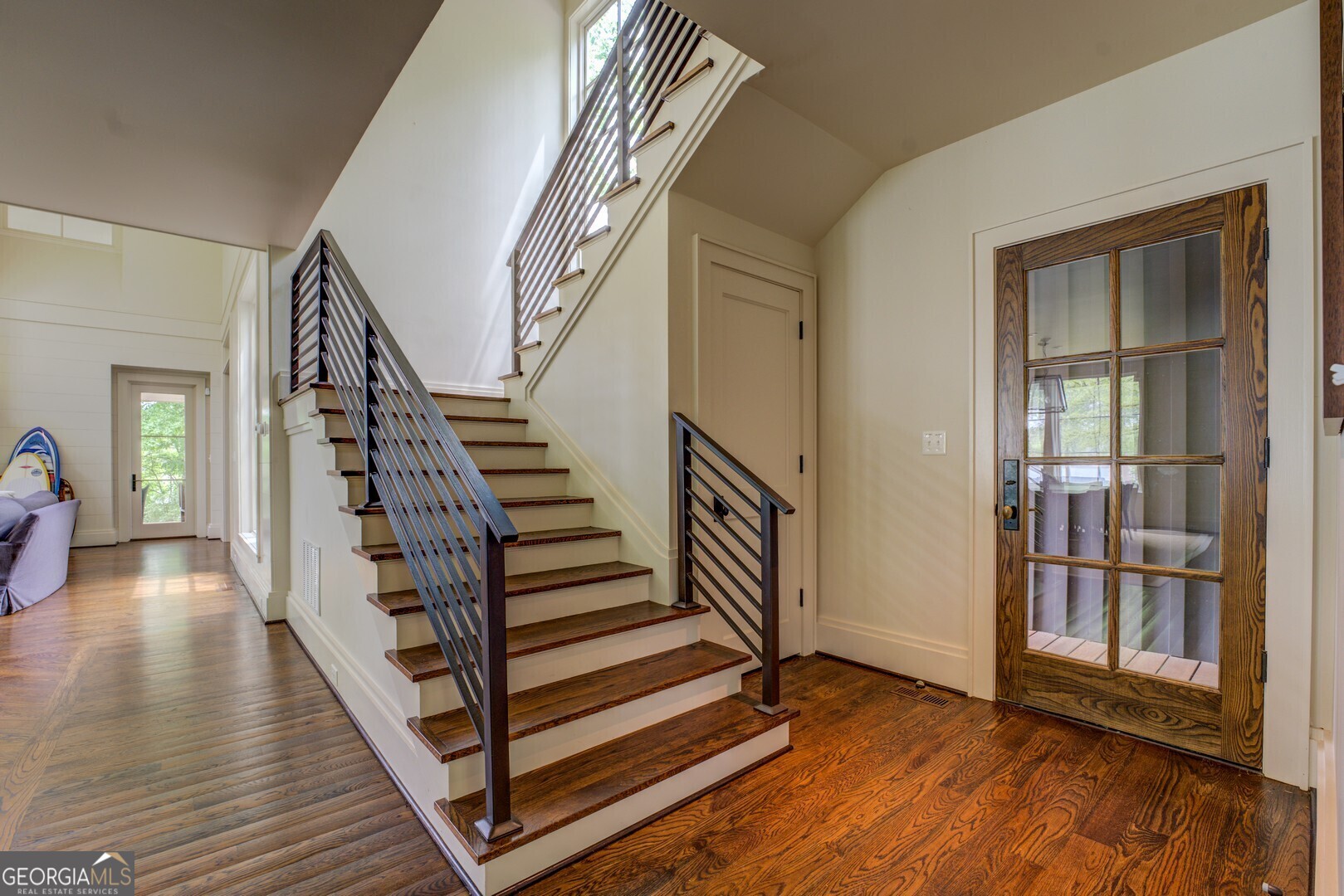172 Tater Hill Road Jackson, GA 30233 - Photo 37 of 84 a view of an entryway with wooden floor and stairs