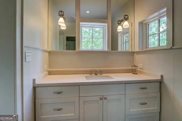 a view of outdoor space with deck and trees