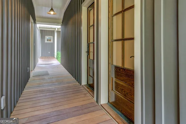 a view of a lake with sitting area