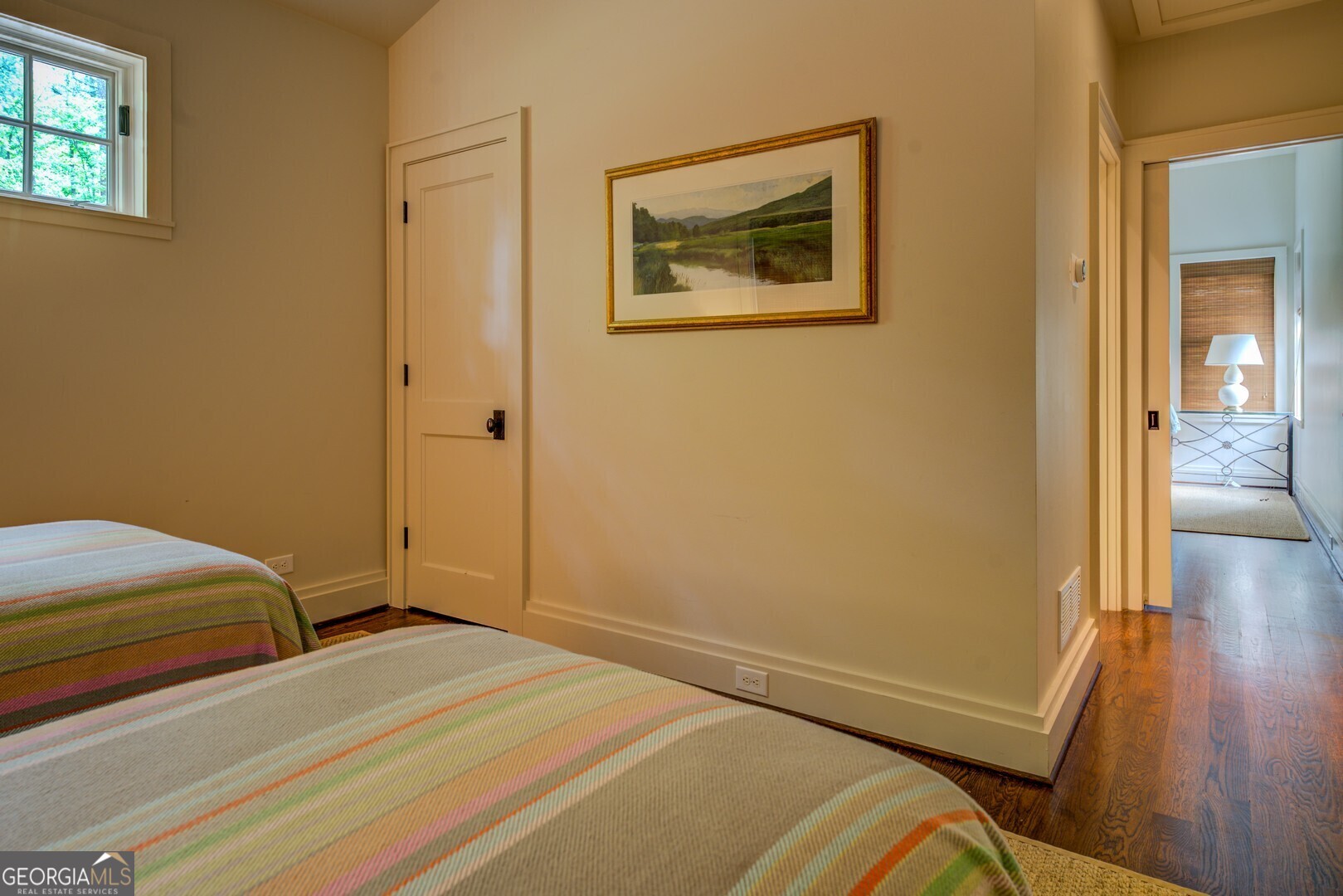 172 Tater Hill Road Jackson, GA 30233 - Photo 46 of 84 a bedroom with a bed and wooden floor