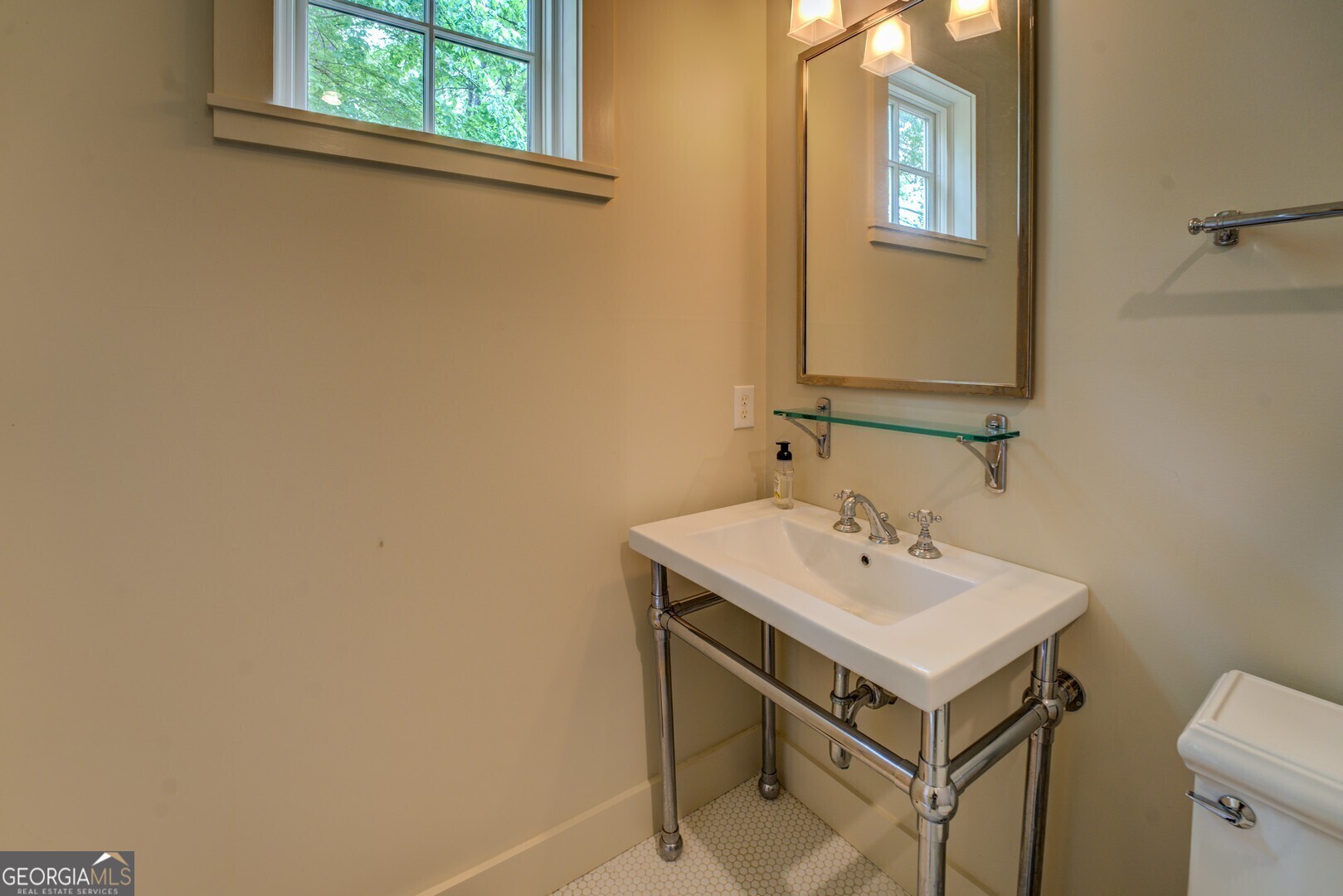 172 Tater Hill Road Jackson, GA 30233 - Photo 56 of 84 a bathroom with a sink and a toilet