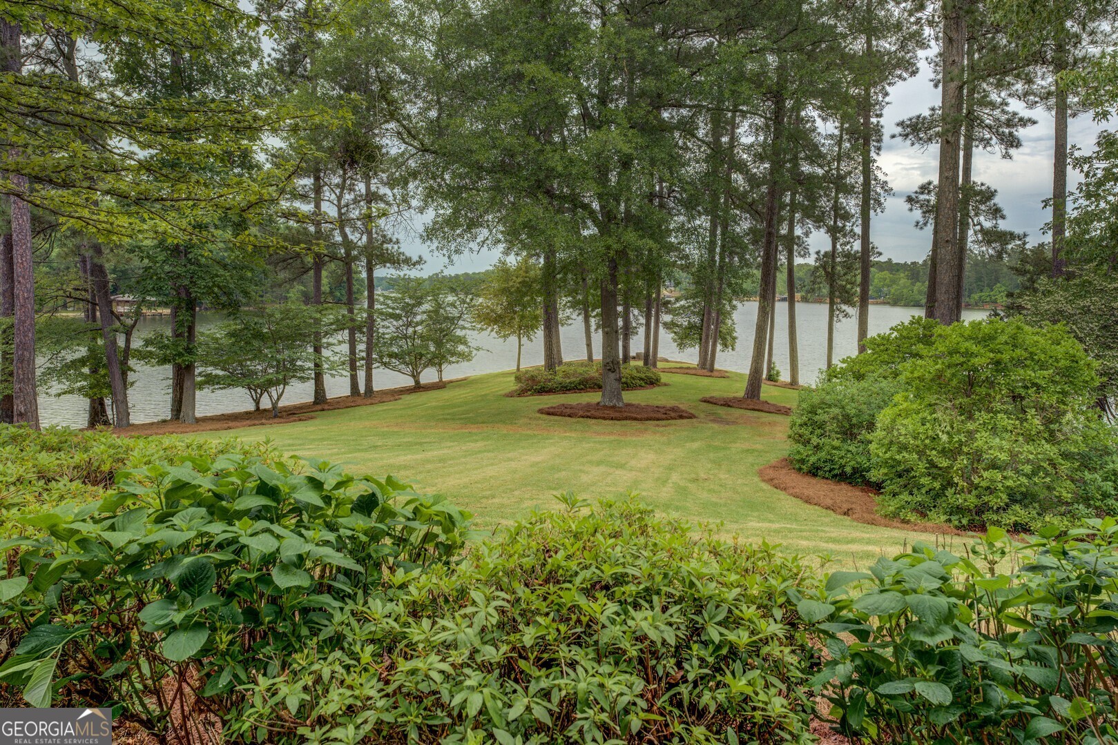 172 Tater Hill Road Jackson, GA 30233 - Photo 67 of 84 a view of outdoor space with deck and trees