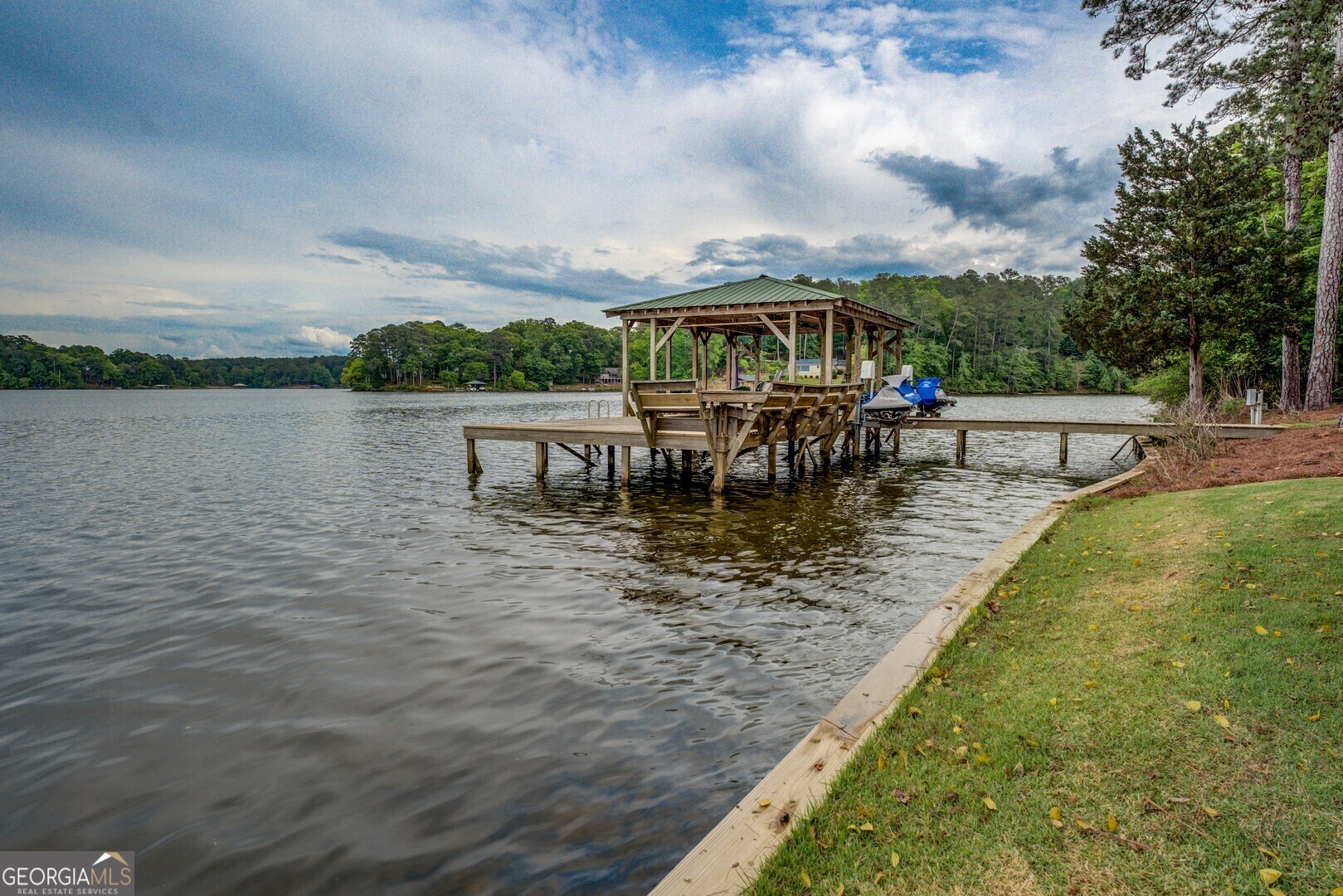 172 Tater Hill Road Jackson, GA 30233 - Photo 76 of 84 a view of a lake with sitting area