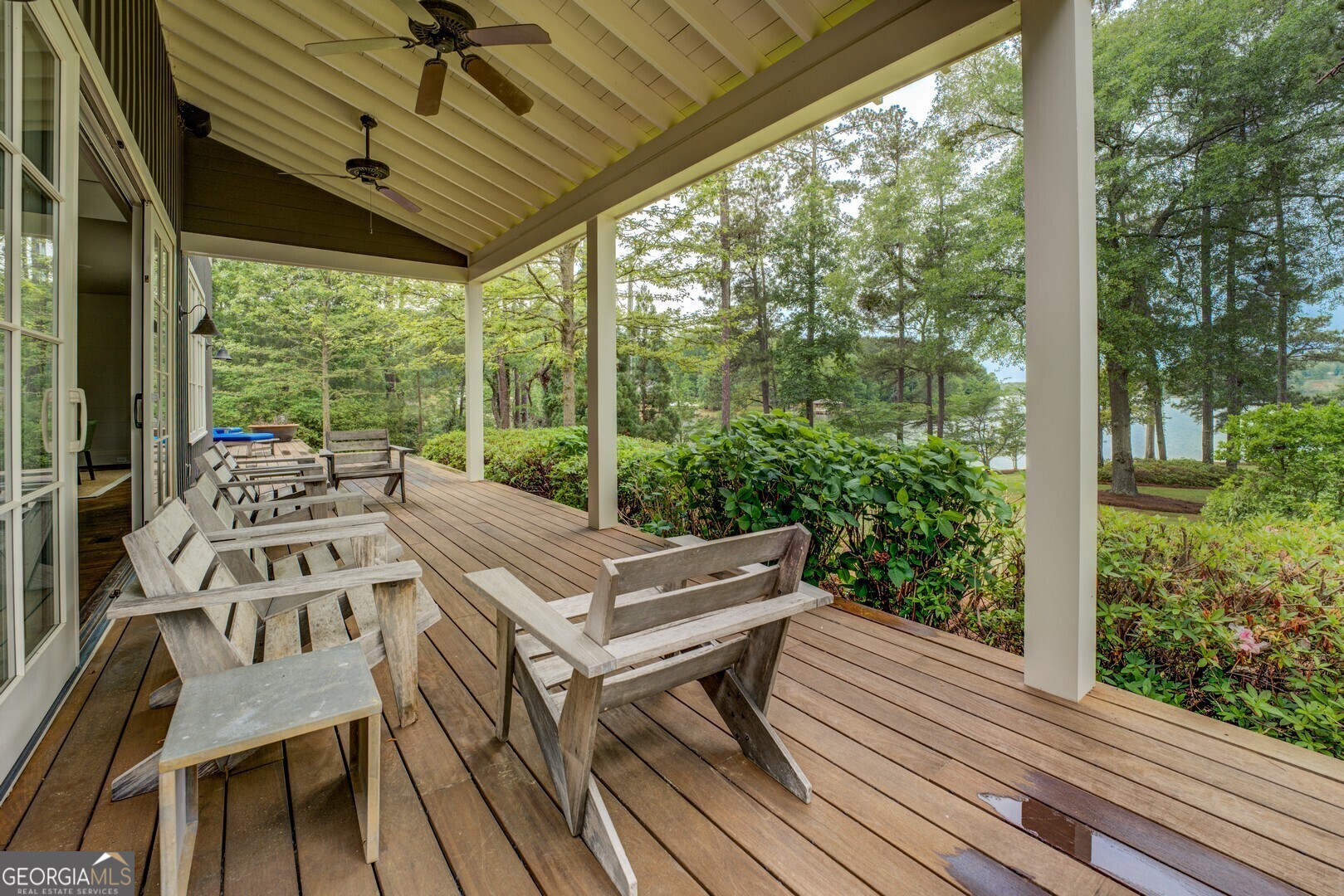 172 Tater Hill Road Jackson, GA 30233 - Photo 80 of 84 a view of a patio with table and chairs and wooden floor